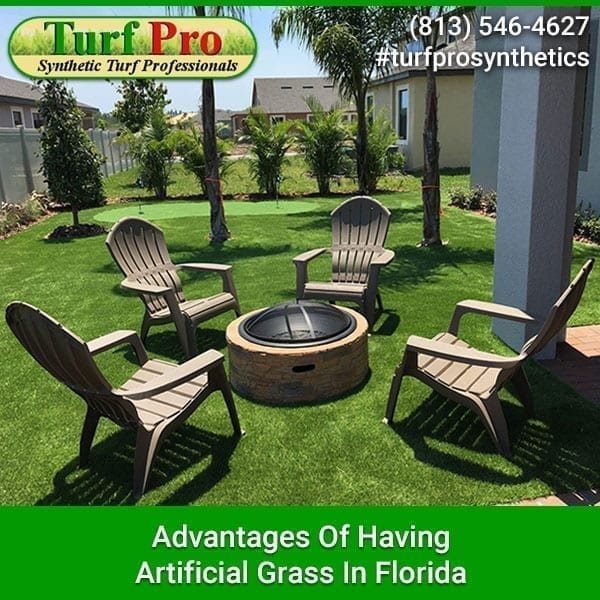 Outdoor seating around a fire pit on artificial grass in Florida.