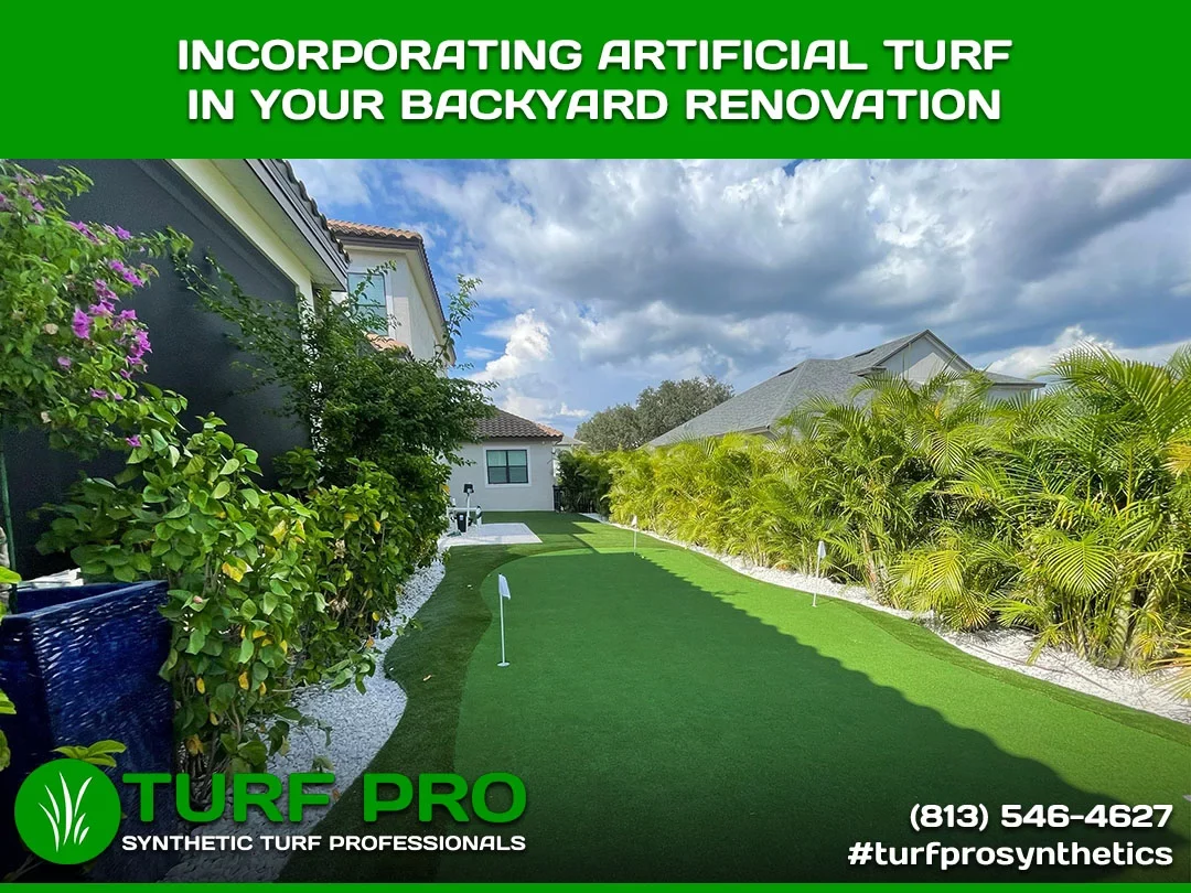 A backyard with artificial turf for renovation, showcasing a green, clean lawn area.